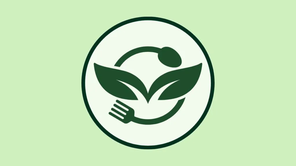 NutritionCrown circular logo with green leaves, fork and protective hands on light green background